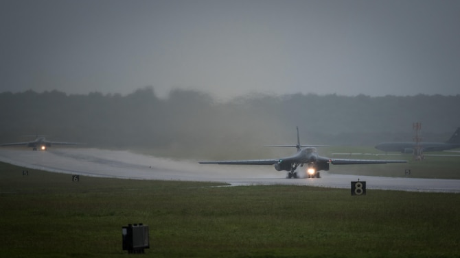 Two U.S. Air Force B-1B Lancers assigned to 37th Expeditionary Bomb Squadron, deployed from Ellsworth Air Force Base, South Dakota, prepare to take off from Andersen Air Force Base, Guam, to fly a bilateral mission with two Koku Jieitai (Japan Air Self-Defense Force) F-15s, Sept. 9, 2017. Participating in bilateral training enables the operational units to improve their combined capabilities and tactical skills, while also building bilateral confidence and strong working relationships. (U.S. Air Force photo by Senior Airman Jacob Skovo)