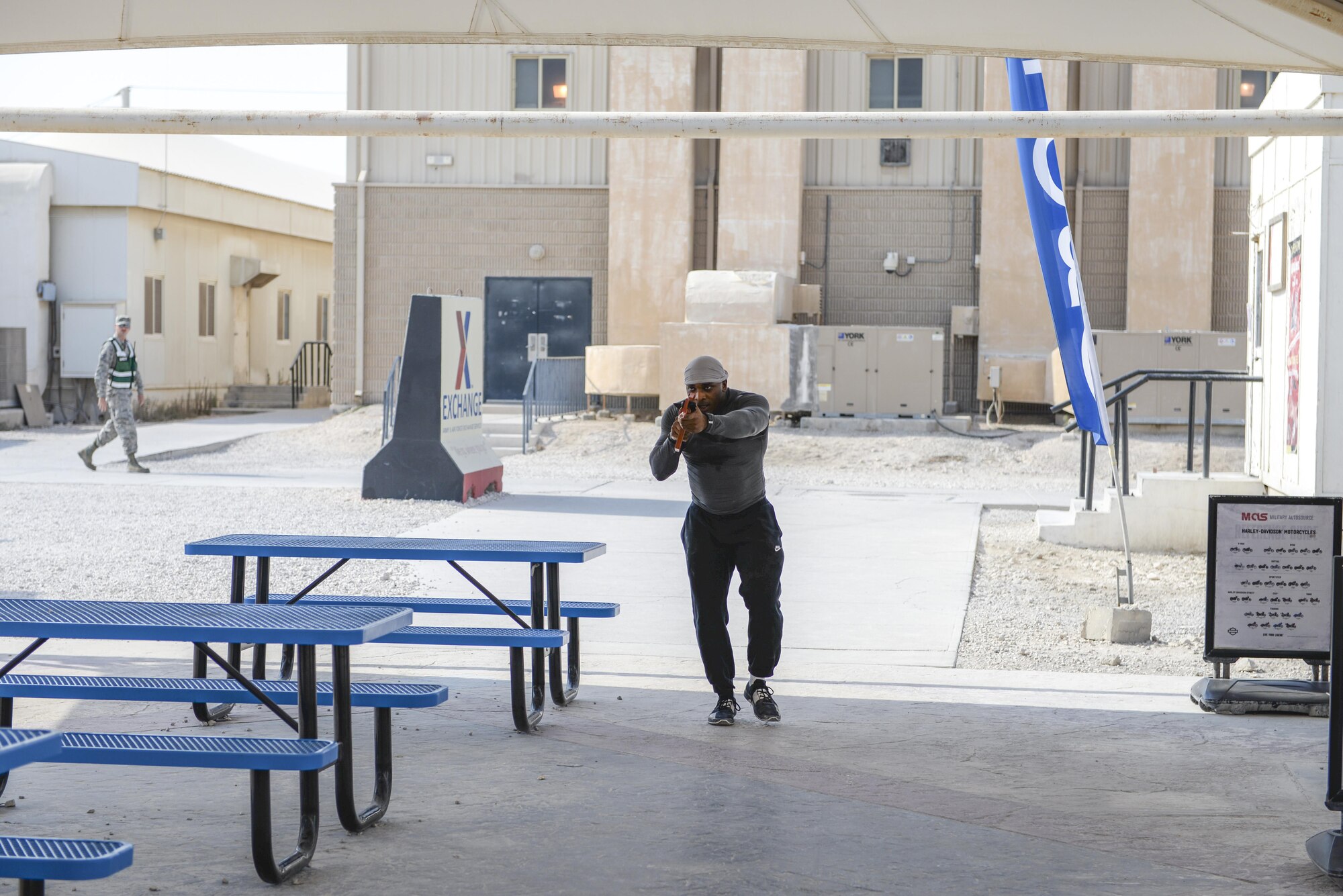 U.S. Air Force Senior Airman Anthony Fields, trainer assigned to the 379th Expeditionary Security Forces Squadron, simulates the aggressor during an active shooter exercise conducted at Al Udeid Air Base, Qatar, Aug. 31, 2017.
