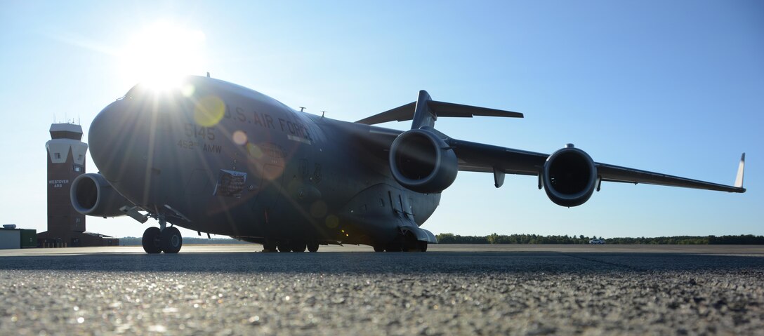 A C-17 Globemaster III sits on the flightline September 9, 2017, at Westover Air Reserve Base, Mass. Three C-17s from Joint Base McGuire-Dix-Lakehurst, New Jersey, Joint Base Lewis-McChord, Washington and March ARB, California, await the loading of Federal Emergency Management Agency supplies by Westover's Aerial Port Squadrons to support those impacted by Hurricane Irma. (U.S. Air Force photo by Airman Hanna N. Smith)