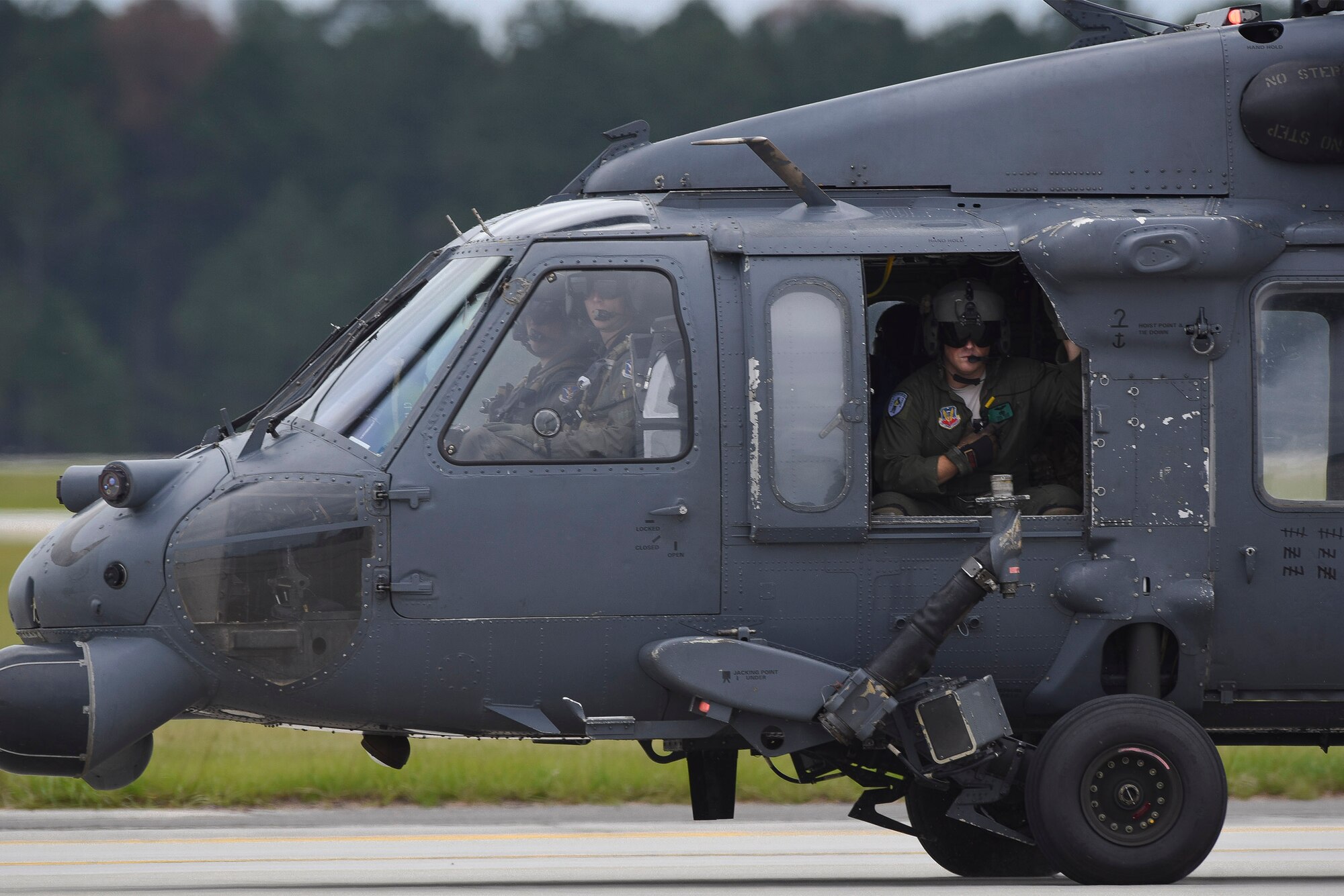 Members of the 41st Rescue Squadron prepare to takeoff in an HH-60G Pavehawk in support of Hurricane Irma, Sept. 9, 2017, at Moody Air Force Base, Ga. Team Moody aircraft and rescue assets travelled to Columbus Air Force Base, Miss., for shelter before re-engaging with other Moody assets to assist the Federal Emergency Management Agency and other first responder agencies during upcoming Hurricane Irma in the Southeast region. (U.S. Air Force photo by Senior Airman Greg Nash)