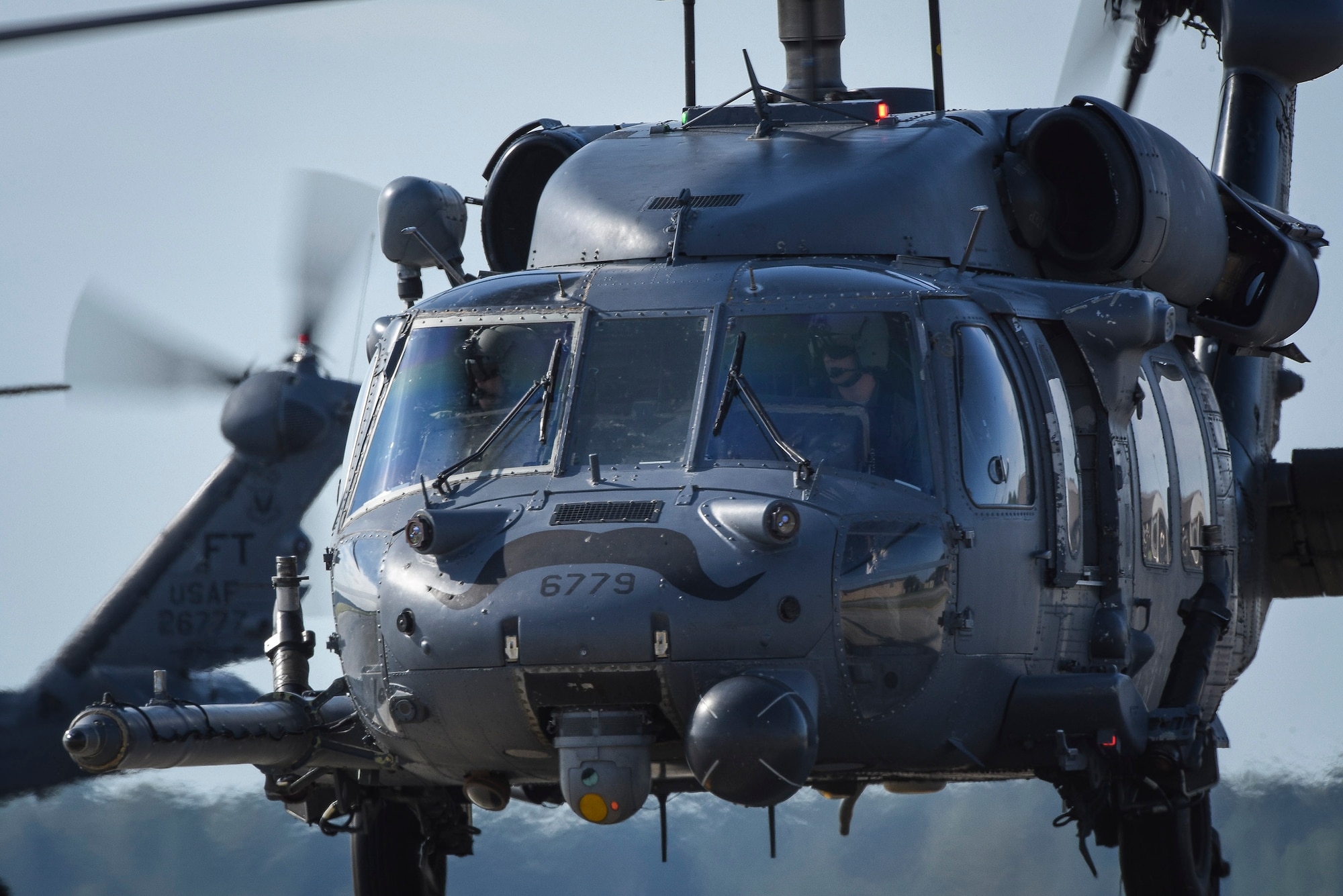 Moody HH-60G Pavehawk pilots prepare to takeoff in support of Hurricane Irma, Sept. 9, 2017, at Moody Air Force Base, Ga. Team Moody aircraft and rescue assets travelled to Columbus Air Force Base, Miss., for shelter before re-engaging with other Moody assets to assist the Federal Emergency Management Agency and other first responder agencies during upcoming Hurricane Irma in the Southeast region. (U.S. Air Force photo by Senior Airman Greg Nash)