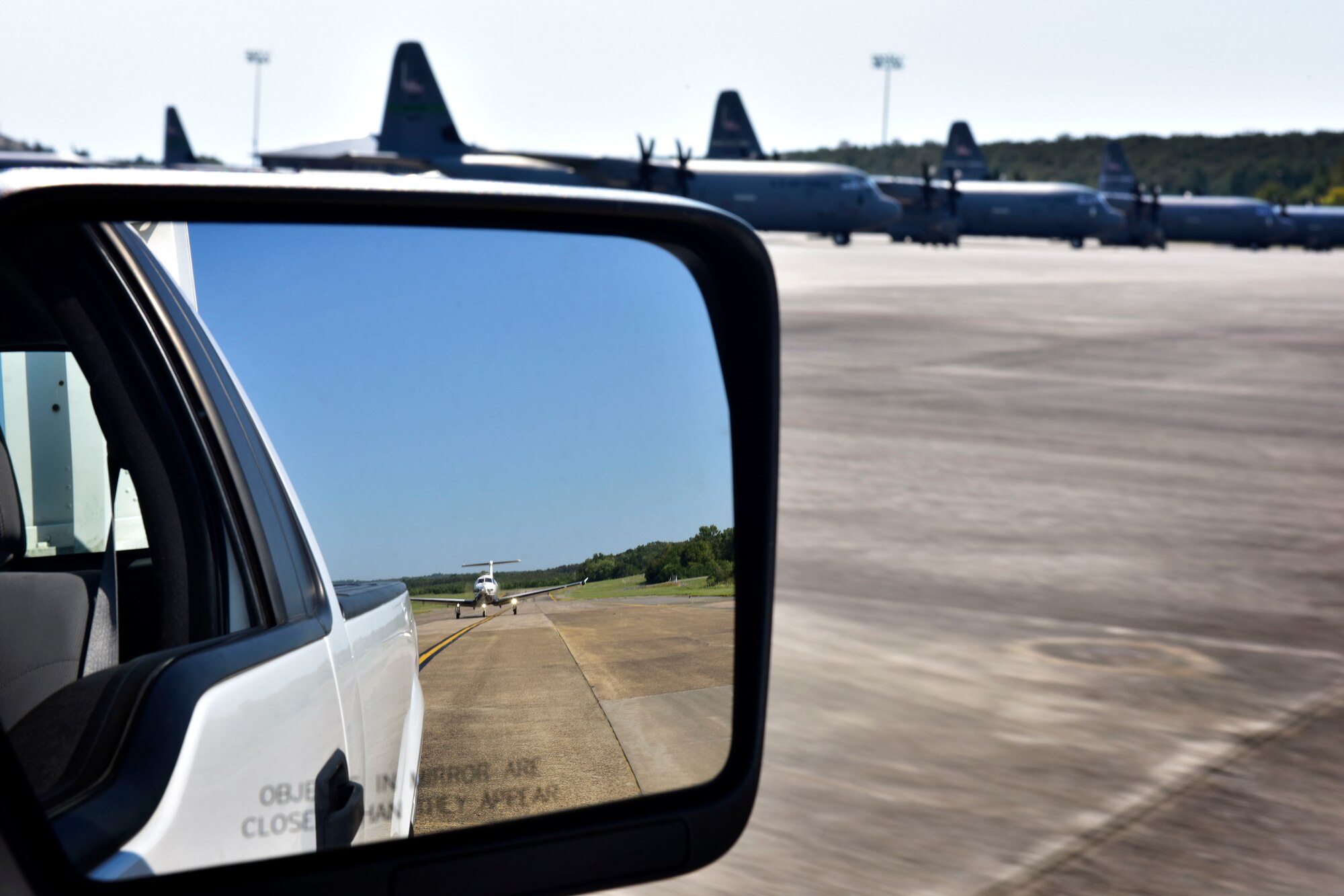 A PC-12 assigned to Hurlburt Field, Fla., taxis behind the follow truck to a parking spot after landing Sept. 9, 2017, at Little Rock Air Force Base, Ark.