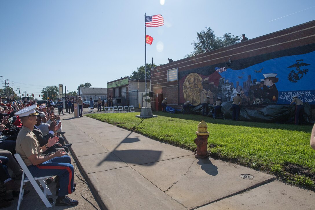 Veterans and Detroit locals watch the unveiling of the Montford Point Marines mural during Marine Week Detroit, Sept. 9, 2017. Marine Week Detroit celebrates the contributions of local Marines whose service to our nation has protected and preserved our way of life for hundreds of years. (U.S. Marine Corps photo by Lance Cpl. Danny Gonzalez)