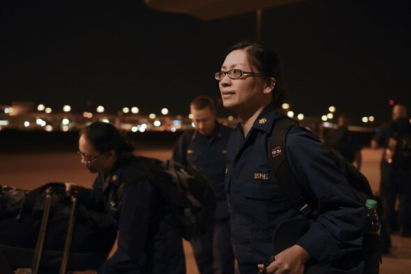 Capt. Aileen Renolayan, U.S. Public Health Service Rapid Deployment Force 5 member, boards a C-130J headed to Orlando International Airport, Fla., Sept. 9, 2017, at the Dallas Fort Worth International Airport Dallas, Texas. The C-130J, assigned to the 41st Airlift Squadron at Little Rock Air Force Base, Ark., also picked up Disaster Medical Assistance Team personnel from Alabama, Kentucky, Tennessee and Ohio to prepare for relief efforts medical after the anticipated fallout from Hurricane Irma. (U.S. Air Force photo by Senior Airman Mercedes Taylor)