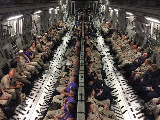 Healthcare professionals requested by the National Disaster Medical System and the U.S. Department of Health and Human Services are aboard a C-17 Globemaster III as part of the Hurricane Irma response.