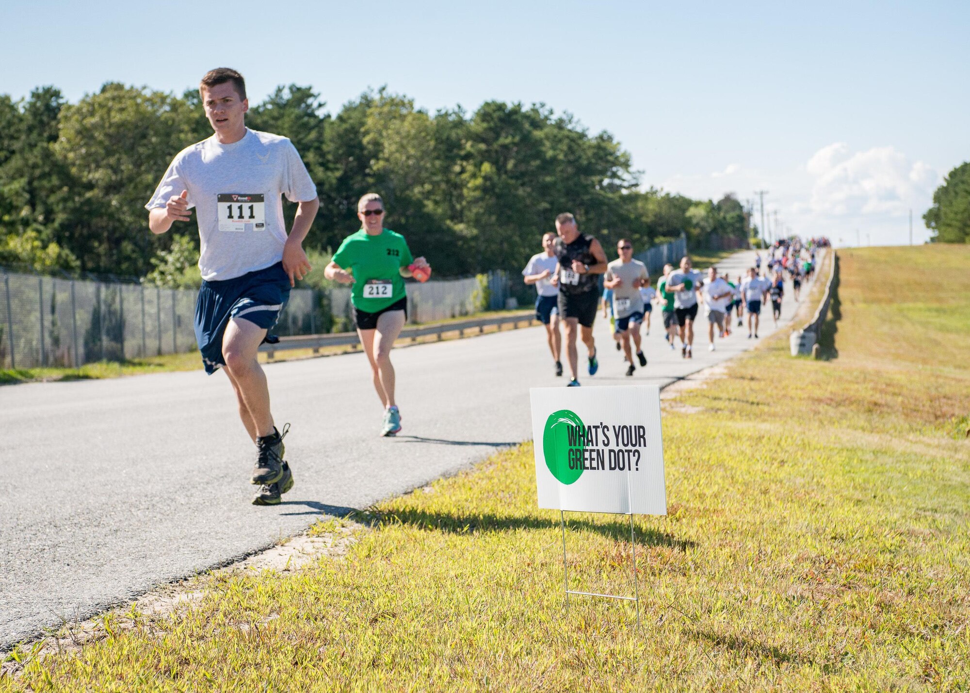 Airmen from the 102nd Intelligence Wing participate in a 5k to raise awareness of the Green Dot program. Green Dot is a non-profit program that aims to prevent incidents of violence.