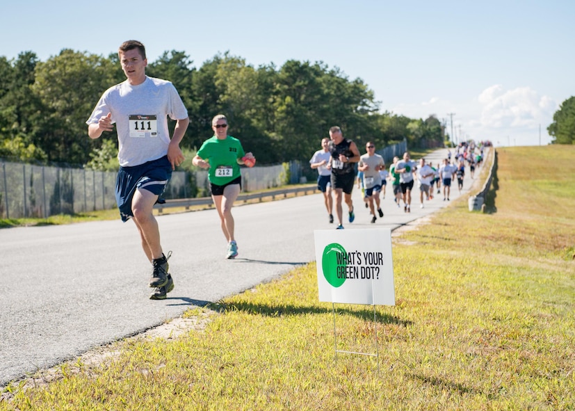 Airmen from the 102nd Intelligence Wing participate in a 5k to raise awareness of the Green Dot program. Green Dot is a non-profit program that aims to prevent incidents of violence.