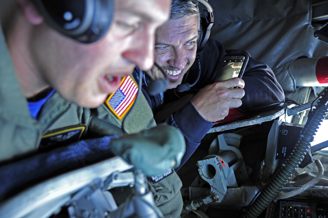 Civilian employers of Reservists and Guardsmen based at Andrews flew in a KC-135R Stratotanker refueling aircraft here Sept. 9 during an Employer Support of the Guard and Reserve-sponsored flight. The flight was an ESGR effort to thank supportive employers of 459th Air Refueling Wing Reservists and 113th Wing D.C. Air National Guardsmen. Employers were flown from Joint Base Andrews to the coast of New Jersey to see an aerial refueling with F-16 Fighting Falcons. (U.S. Air Force photo/Tech. Sgt. Brent Skeen)