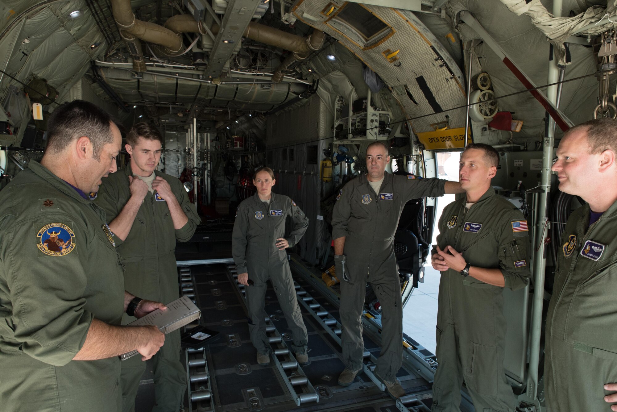 Maj. Andy Thomas, a 96th Airlift Squadron pilot at Minneapolis-St. Paul Air Reserve Station, Minn. briefs crew members prior to flight Sep. 8, 2017.   (U.S. Air Force photo by Master Sgt. Eric Amidon/ Released)