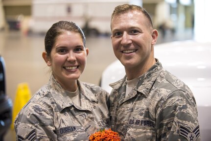 Senior Airman Lauren Durham and Michael Davis exchanged vows at the Orange County Convention Center in Orlando before heading out on search and recovery missions