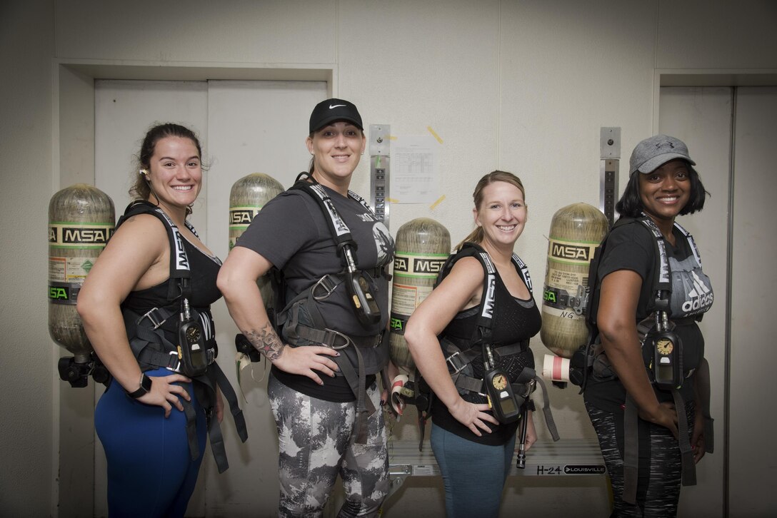Members of the Wonder Women Warriors team from the 374th Mission Support Group pose for a picture during the Sept. 11 Tower Run at Yokota Air Base, Japan, Sept. 8, 2017.