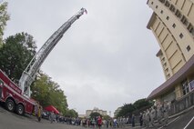 Participants conduct a moment of silence for the emergency responders who lost their lives on Sept. 11, before the Tower Run at Yokota Air Base, Japan, Sept. 8, 2017.