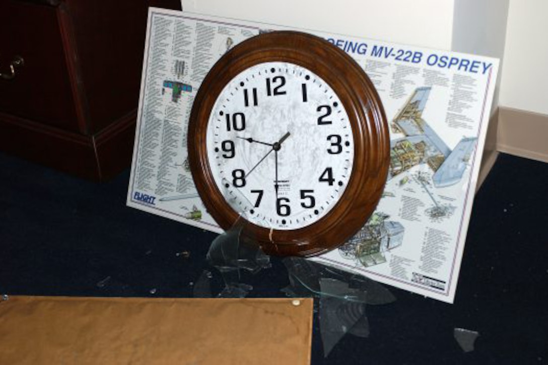 A clock stopped at the time a plane flew into the Pentagon.