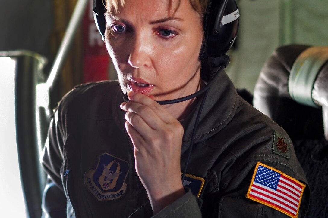 A member of the Air Force speaks into a microphone.