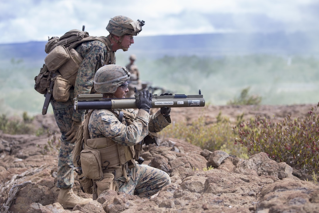 Marine Corps Lance Cpl. Ricky Derby fires a light anti-tank weapon during a live-fire training event at Pohakuloa Training Area, Hawaii, Aug. 18, 2017.