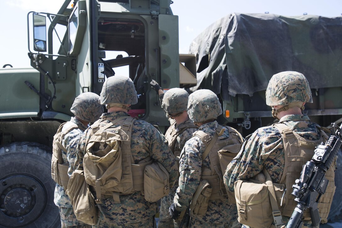 Marines with Motor Transport platoon, 2nd Amphibious Assault Battalion are given a run-through of Gunnery Table 5 at Camp Lejeune, N.C., Sept. 7-9.