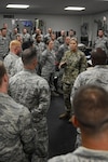 Lt. Col. Elizabeth Evans, 53rd Brigade Engineer Battalion Commander, speaks to the 202nd REDHORSE team as they stand by for Hurricane Irma to pass, Sept. 10, 2017.