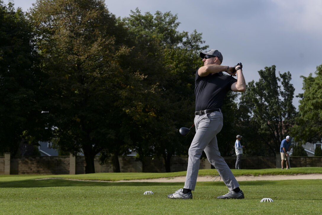 Lt. Col. Ed Szczepanik, 436th Airlift Wing chief of safety drives a golf ball Sept. 7, 2017, during the Bluesuiters’ Golf Tournament at Eagle Creek Golf Course on Dover Air Force Base, Del. The biannual tournament offered Team Dover Airmen a chance to win various prizes and connect with local civic and business leaders. (U.S. Air Force photo by Staff Sgt. Aaron J. Jenne)