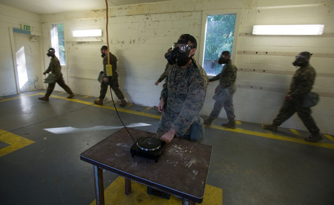 Marines and Sailors with 2nd Medical Battalion air out their uniforms during a quarterly gas chamber qualification on Camp Lejeune, N.C., Sept. 8, 2017.