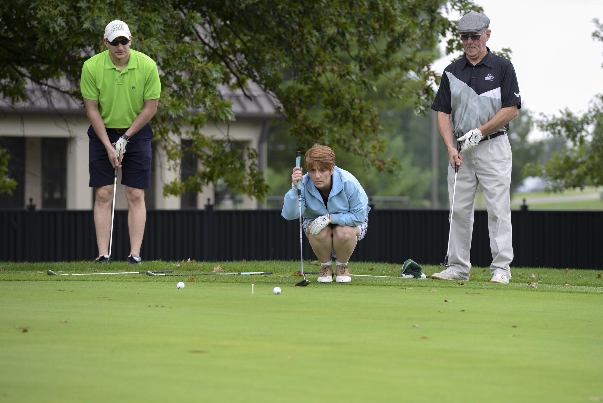Col. Dawn Lancaster, Air Force Mortuary Affairs Office commander, lines up a put Sept. 7, 2017, during the Bluesuiters’ Golf Tournament at Eagle Creek Golf Course on Dover Air Force Base, Del. Team Dover Airmen teamed with local civic leaders to build and maintain good community relations. (U.S. Air Force photo by Staff Sgt. Aaron J. Jenne)