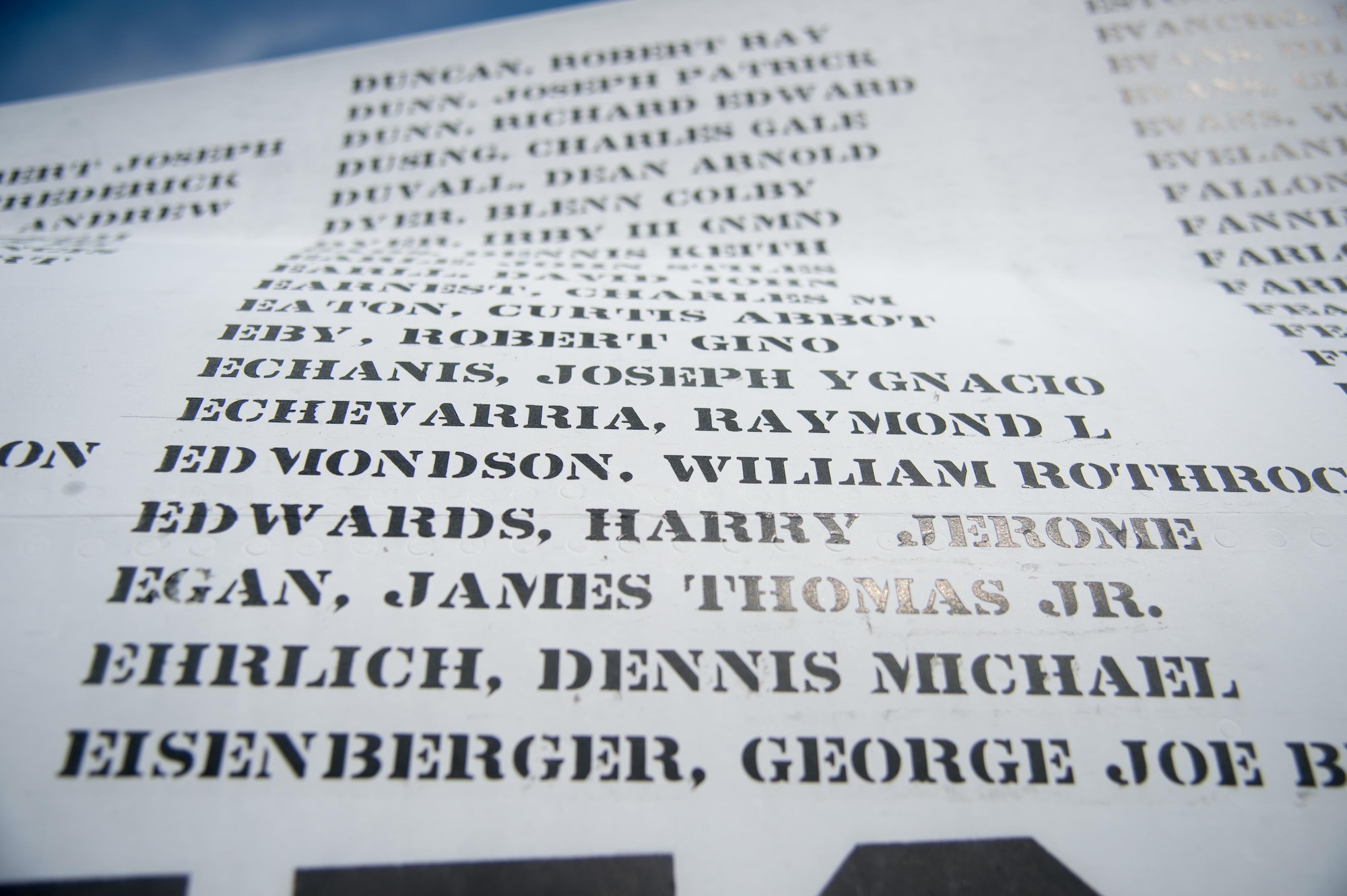 Names line the fuselage of an Army OV-1 Mohawk observation and surveillance aircraft Aug. 27, 2017, during the Thunder Over Dover Open House at Dover Air Force Base, Del. There are 1,636 names on the plane for each service member who never returned home from the Vietnam War. (U.S. Air Force photo by Staff Sgt. Jared Duhon)