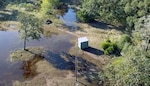 An aerial photo taken by a drone belonging to Maj. Michael Stump, U.S. Army South fire support officer, of flooded ranch in Ezzell, Texas, affected by Hurricane Harvey. The aerial footage was used by the Guadalupe Valley Electric Cooperative to determine if there was a disruption of power to residents in the area.