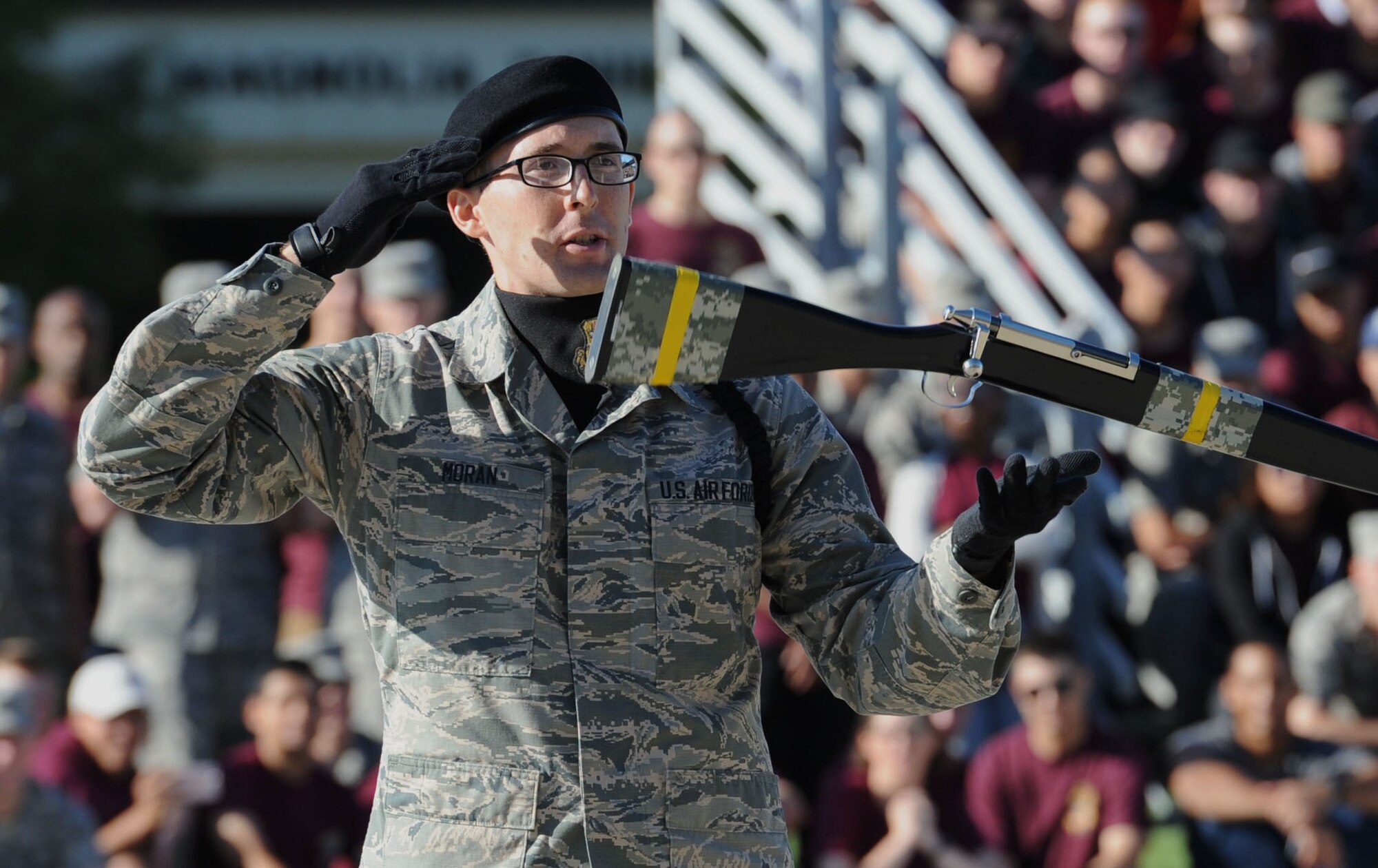 Airman 1st Class Martin Moran, 334th Training Squadron freestyle drill team drillmaster, spins a rifle during the 81st Training Group drill down on the Levitow Training Support Facility drill pad Sept. 8, 2017, on Keesler Air Force Base, Mississippi. Airmen from the 81st TRG competed in a quarterly open ranks inspection, regulation drill routine and freestyle drill routine. The 334th TRS “Gators” took first place this quarter. (U.S. Air Force photo by Kemberly Groue)