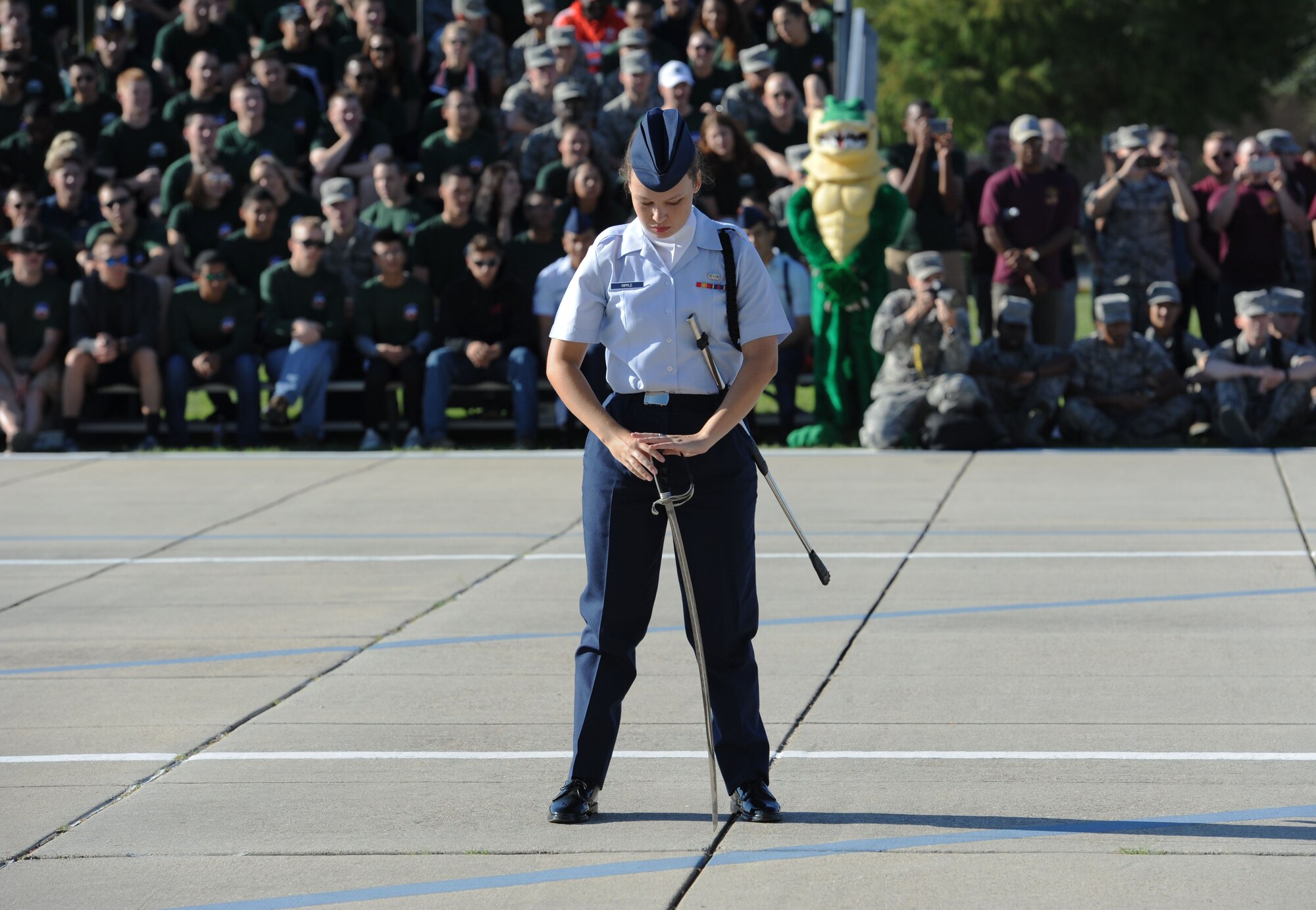 Airman Basic Brooke Ripple, 335th Training Squadron freestyle drill team drillmaster, performs during the 81st Training Group drill down on the Levitow Training Support Facility drill pad Sept. 8, 2017, on Keesler Air Force Base, Mississippi. Airmen from the 81st TRG competed in a quarterly open ranks inspection, regulation drill routine and freestyle drill routine. The 334th TRS “Gators” took first place this quarter. (U.S. Air Force photo by Kemberly Groue)