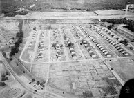 IMAGE: 10/28/1945
AEROGRAPHIC HISTORY: North view of Naval Proving Ground (NPG) showing low-cost housing project of
"Boomtown/Tarrytown". F/L=10" Approximate Altitude= 800'