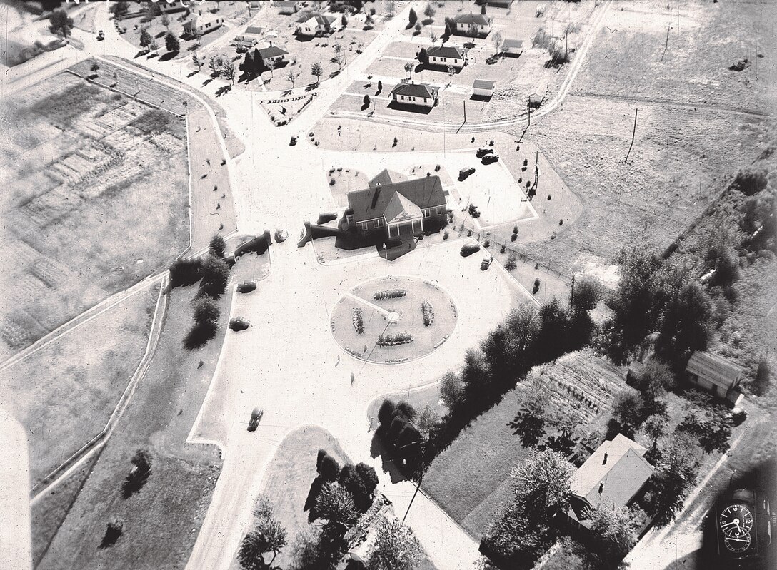 IMAGE: 10/28/1945
AEROGRAPHIC HISTORY: South-East view of Naval Proving Ground (NPG)-showing Main Gate and area surrounding.
F/L=10" Approximate Altitude=500'