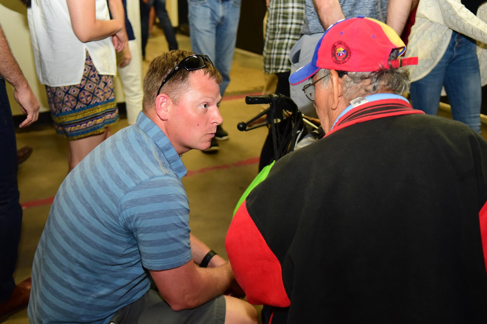 559th Flying Training Squadron commander, Lt. Col. Matthew Russell listens to a homeless man he met during a volunteer opportunity at the Haven for Hope near downtown San Antonio September 7, 2017.  Russell and other leaders from the 12th Flying Training Wing spent time at the HfH learning leadership techniques from HfH's staff.