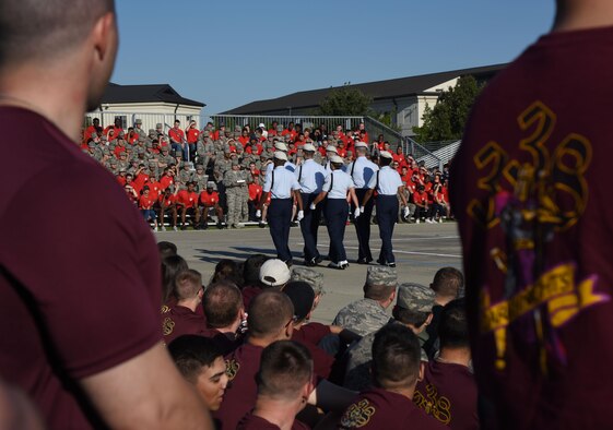 Members of the 334th Training Squadron regulation drill team perform during the 81st Training Group drill down on the Levitow Training Support Facility drill pad Sept. 8, 2017, on Keesler Air Force Base, Mississippi. Airmen from the 81st TRG competed in a quarterly open ranks inspection, regulation drill routine and freestyle drill routine. The 334th TRS “Gators” took first place this quarter. (U.S. Air Force photo by Kemberly Groue)