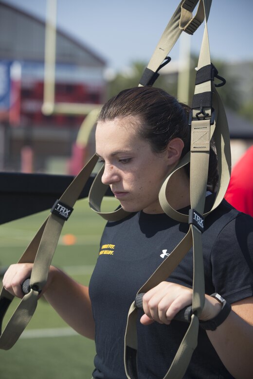 1st Lt. Margo Smutnick, manpower officer, Marine Corps Air Ground Task Force adjutant, readies herself before starting the first tactical movement of the High Intensity Tactical Training Tactical Athlete Championship at the 11 Area Football Field aboard Marine Corps Base Camp Pendleton, Calif., August 30, 2017. The fast paced competition challenged participants mentally and physically to become fit and adaptable Marines capable of fighting in any clime and place. (U.S. Marine Corps photo by Pfc. Margaret Gale)