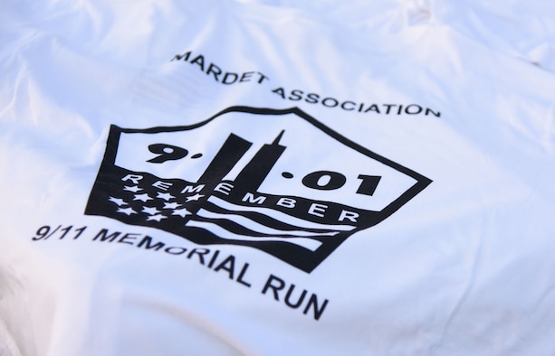 A commemorative T-shirt is on display during a 3.7 mile remembrance run across the Ocean Springs/Biloxi Bridge Sept. 9, 2017, in Mississippi. The event honored those who lost their lives during the 9/11 attacks. (U.S. Air Force photo by Kemberly Groue)
