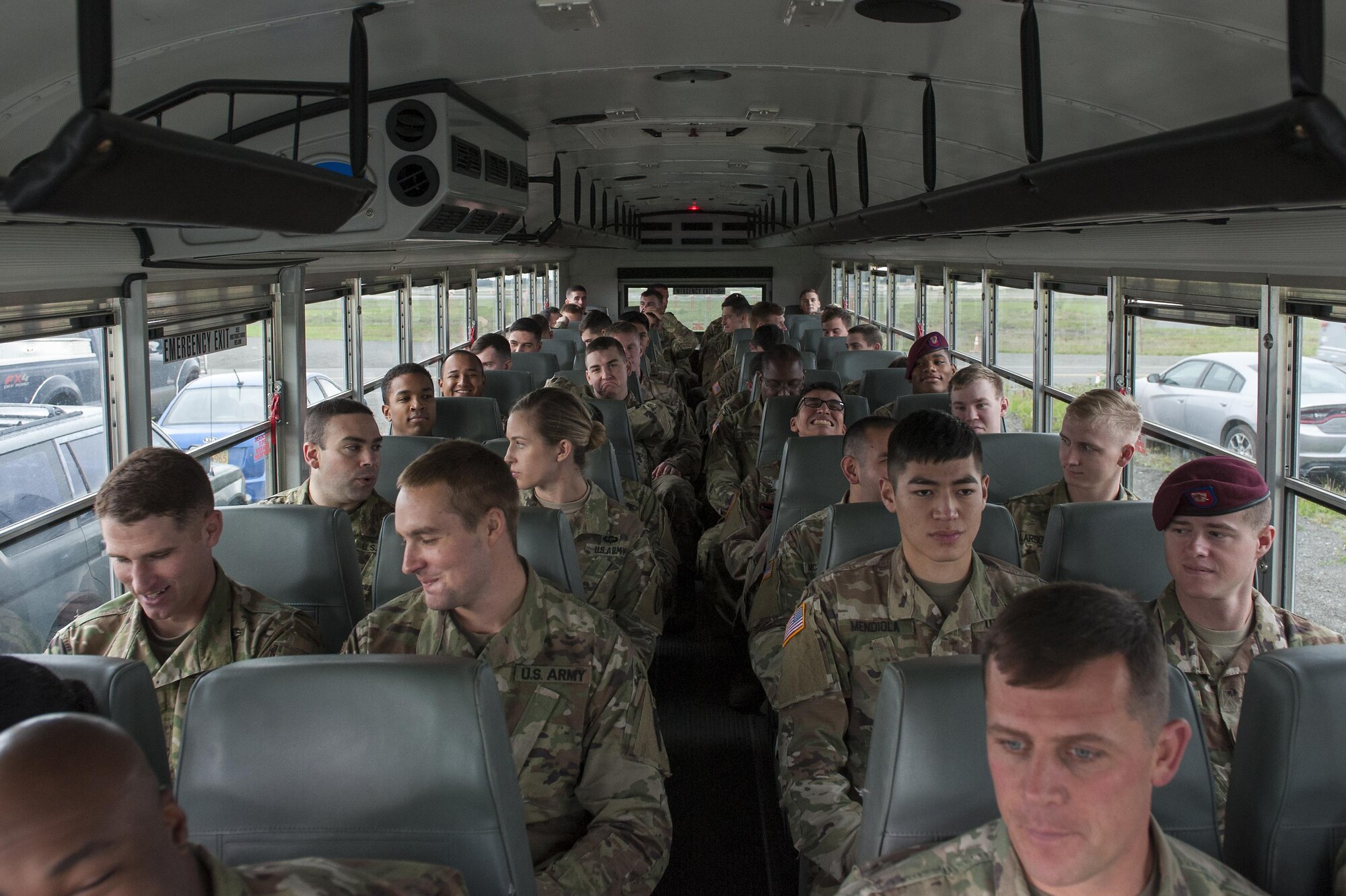 U.S. Army Soldiers with the 4th Brigade Combat Team (Airborne), 25th Infantry Division, board a bus enroute to the Joint Mobility Center prior to conducting an airborne jump on Sept. 6, 2017, at Joint Base Elmendorf-RIchardson, Alaska. The Soldiers of 4/25 IBCT (ABN)  recently completed a series of jumps to ensure that they maintain their airborne qualiﬁcation during the brigade’s upcoming deployment to Afghanistan.