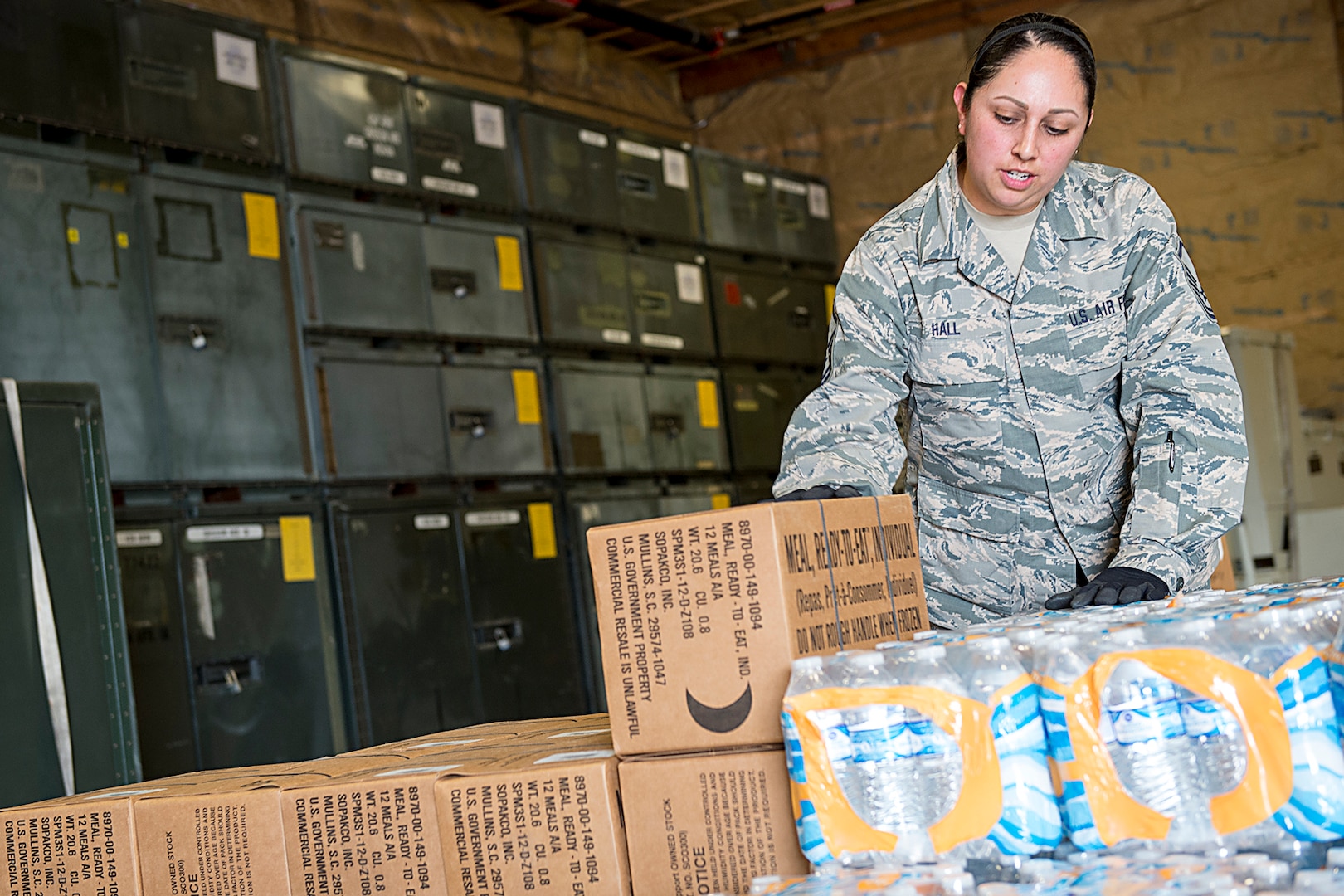 Master Sgt. Angie Hall, 434th Logistics Readiness Squadron combat readiness technician, palletizes water and meals ready to eat at Grissom Air Reserve Base, Ind., Sept. 11, 2017. The cargo is being prepared for shipment to Florida as part of Hurricane Irma relief efforts. (U.S. Air Force photo/Douglas Hays)
