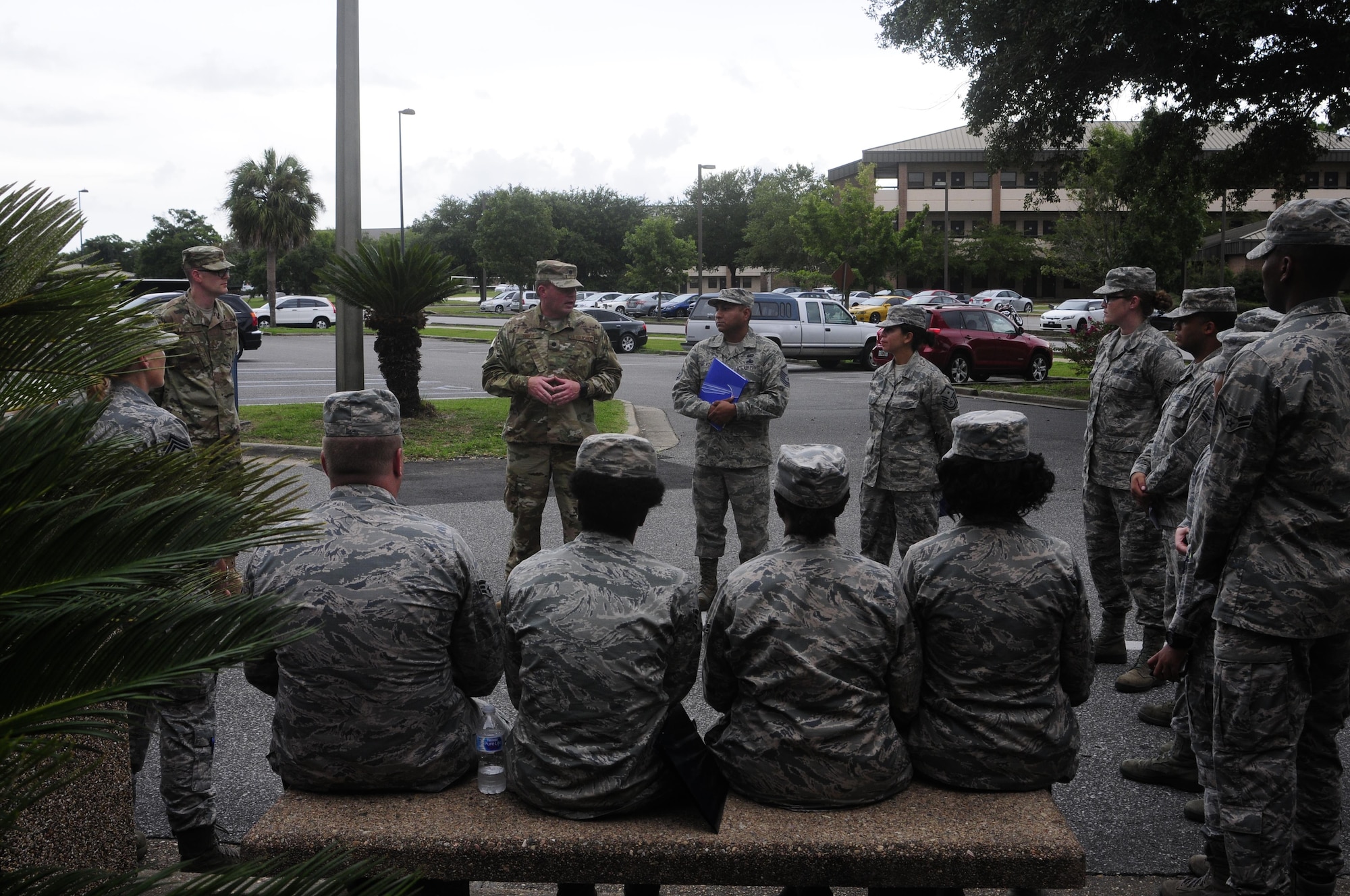 Lt. Col. Christopher Davis, commander of the 137th Special Operations Force Support Squadron at Will Rogers Air National Guard Base in Oklahoma City, gives remarks to members of his squadron during their annual training days at the 1st Special Operations Wing, Hurlburt Field, Florida, Aug. 11, 2017. Twenty Airmen from the 137 SOFSS attended the training event to integrate with active duty personnel on lodging, mortuary, fitness, contingency operations, training, readiness and other duties that are part of their squadron readiness requirements. (U.S. Air National Guard photo by Tech. Sgt. Trisha K. Shields/Released)