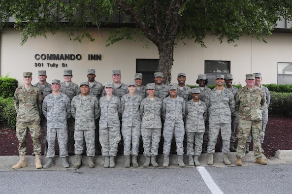 Airmen from the 137th Special Operations Force Support Squadron pose for a group picture during their annual training days at the 1st Special Operations Wing, Hurlburt Field, Florida, Aug. 11, 2017. Twenty Airmen from the 137 SOFSS attended the training event to integrate with active duty personnel on lodging, mortuary, fitness, contingency operations, training, readiness and other duties that are part of their squadron readiness requirements. (U.S. Air National Guard photo by Tech. Sgt. Trisha K. Shields/Released)