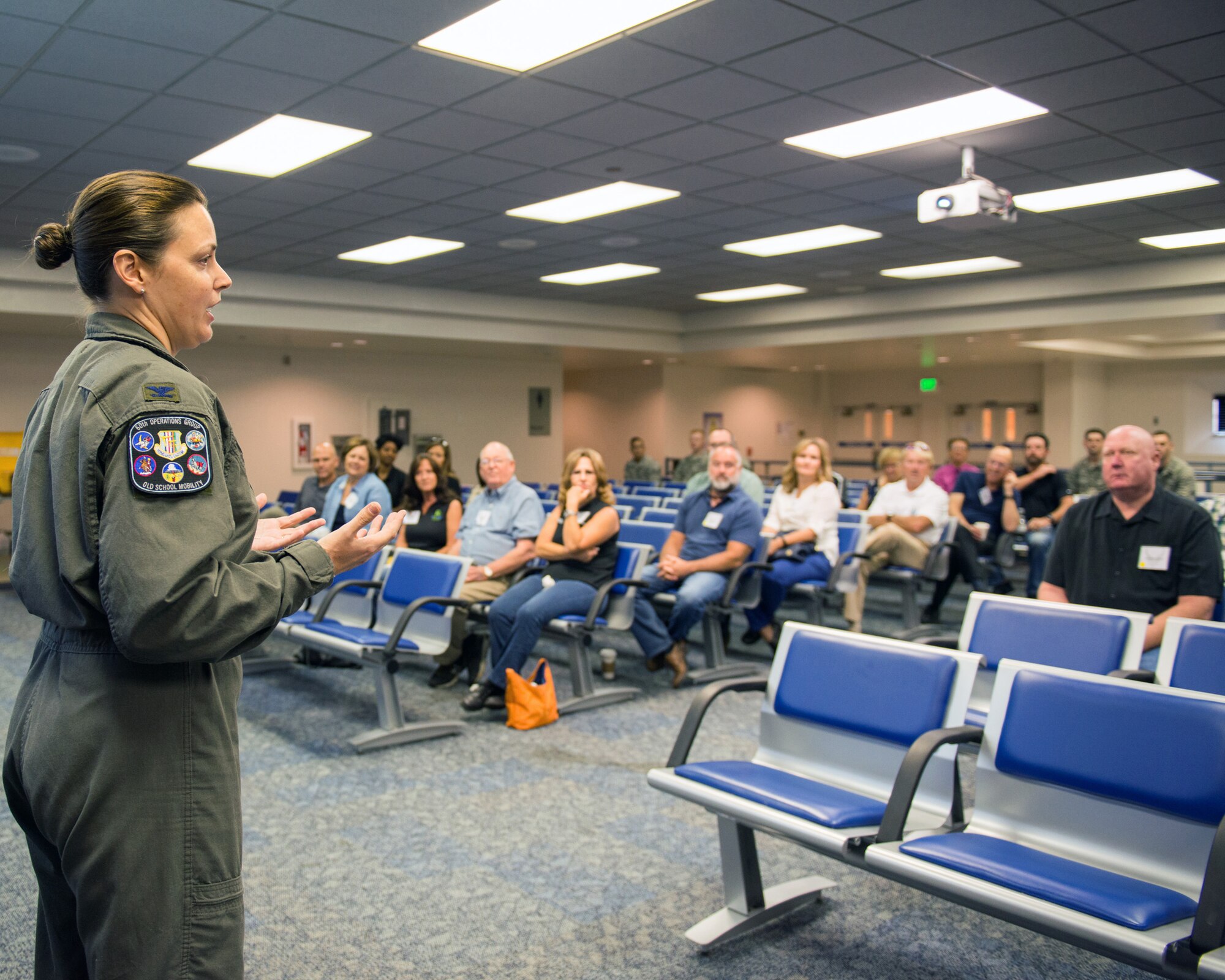 U.S. Air Force Col. Theresa Weems, 60th Operations Group commander, welcomes Honorary Commanders during their tour of the 60th Operations Group at Travis Air Force Base, Calif., Sep. 1, 2017.  The purpose of the Travis Air Force Base Honorary Commander Program is to promote relationships between base senior leadership and civilian partners, foster civic appreciation of the Air Force mission and its Airmen, maximize opportunities to share the Air Force story with new stewards, and to communicate mutual interest, challenges, and concerns that senior leaders and civilian stakeholders have in common. (U.S. Air Force photo by Louis Briscese)