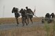 A team of security forces Airmen pull a tire during the annual Aces Cop Combat Challenge Sept. 8, 2017, at Malmstrom Air Force Base, Mont. The tire pull was one of 11 obstacles during the competition. (U.S. Air Force photo/Airman 1st Class Daniel Brosam)