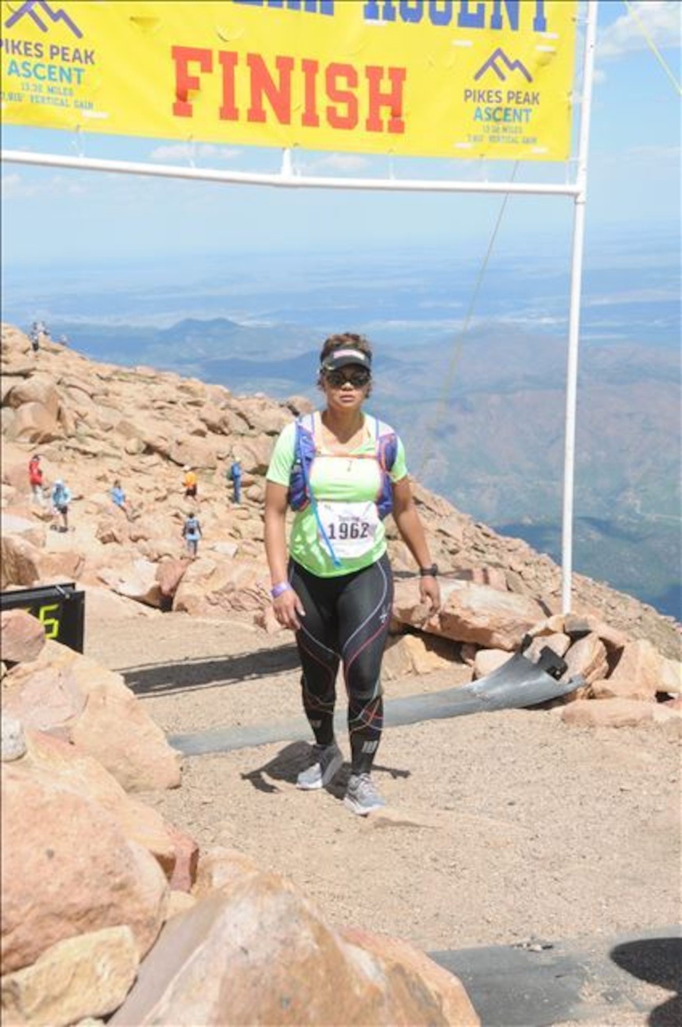 Lt. Col. Tammy Dotson, 21st Mission Support Group deputy commander, crossed the finish line of the Pikes Peak Ascent race Aug. 19, 2017. Dotson is pursuing a goal to run a half marathon in every state. She has already completed races in 16 states. (Courtesy photo)