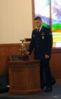 Airman 1st Class Dean York, 341st Civil Engineer Squadron, rings a ceremonial bell, signifying a firefighter’s last alarm, a tradition in fire service which reflects the respect and honor given to those who sacrificed their lives in the line of duty. A 9/11 remembrance ceremony was held at the Malmstrom Air Force Base, Mont., chapel Sept. 11, 2017, to pay tribute to those who perished in the terrorist attacks 16 years ago. (U.S. Air Force photo/Christy Mason)