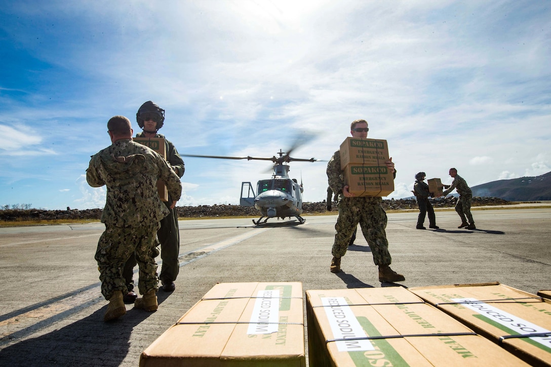 U.S. Marines with the 26th Marine Expeditionary Unit (MEU), deliver food and water by way of UH-1Y Venom helicopters to St. Thomas Cyril King E. Airport, U.S. Virgin Islands in order to aid victims of Hurricane Irma in the U.S. Virgin Islands, Sept. 10, 2017. The 26th MEU is supporting the lead federal agency in providing humanitarian relief efforts for Hurricane Irma.