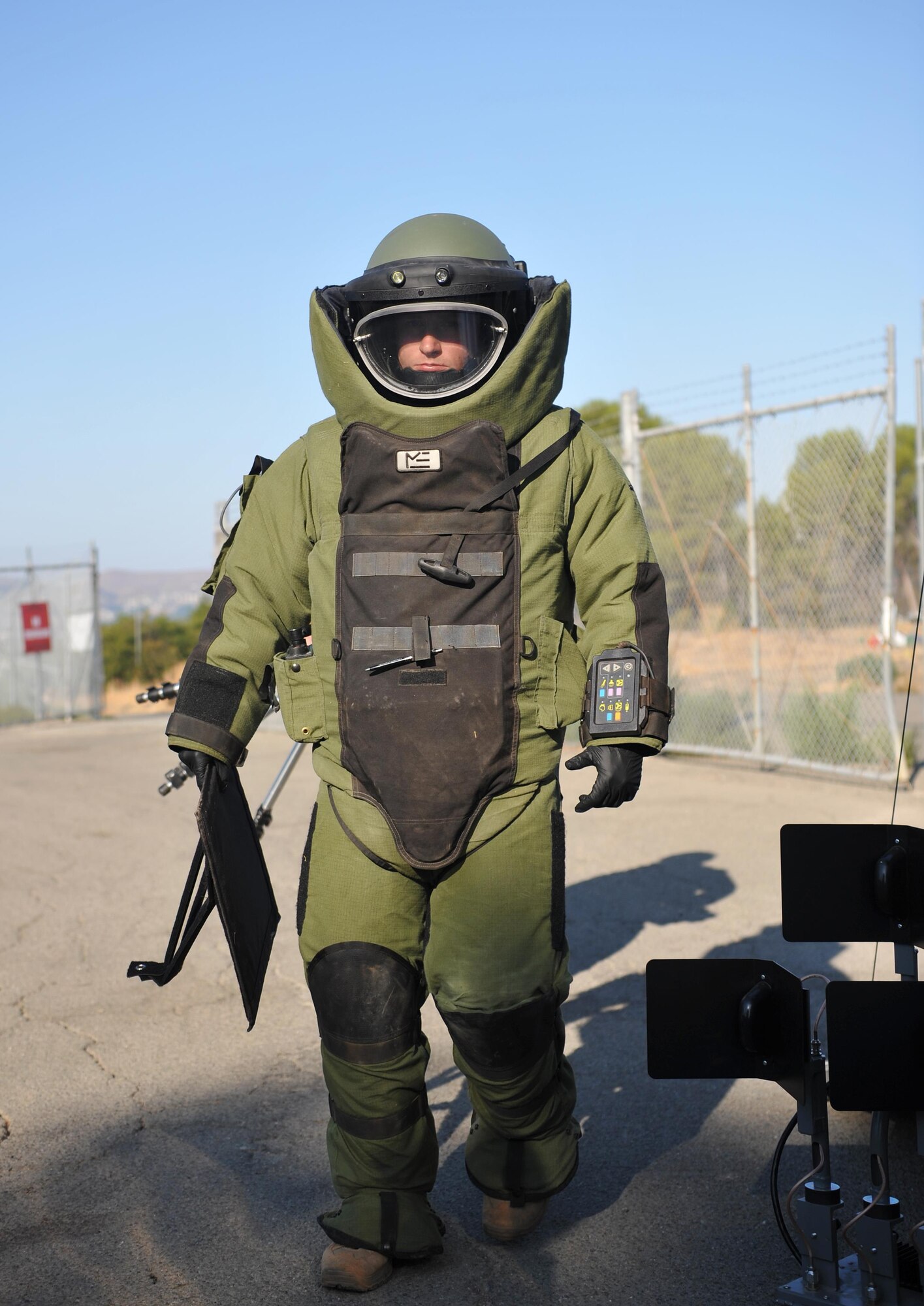 Senior Airman Jared Basham, 9th Civil Engineer Squadron explosive ordnance technician, responds to a scenario in a bomb suit during Urban Shield