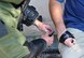 Staff Sgt. Robert Powell (left), 9th Civil Engineer Squadron explosive ordnance technician, disables a simulated explosive device during Urban Shield