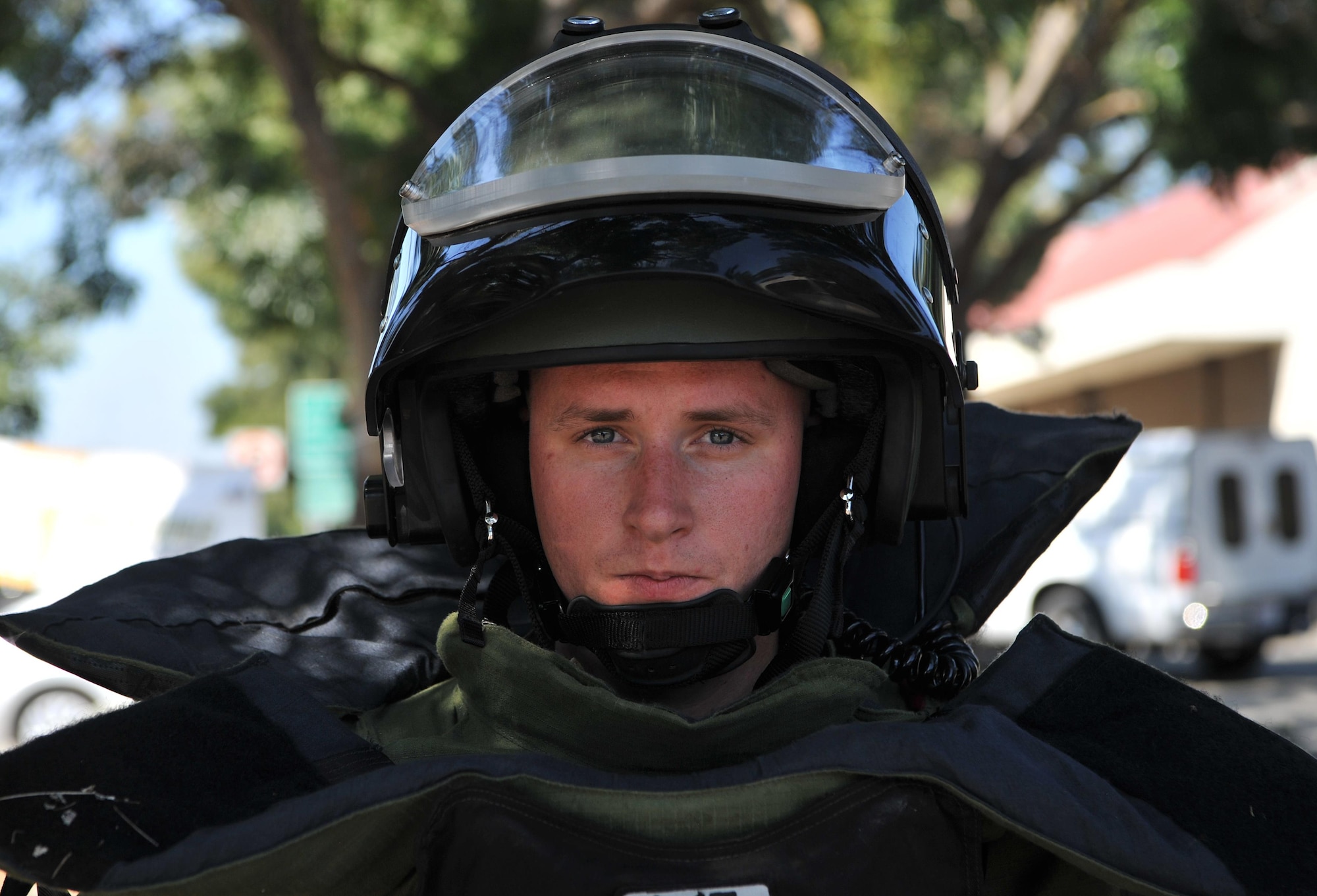 Senior Airman Jared Basham, 9th Civil Engineer Squadron explosive ordnance technician, dons a bomb suit during Urban Shield