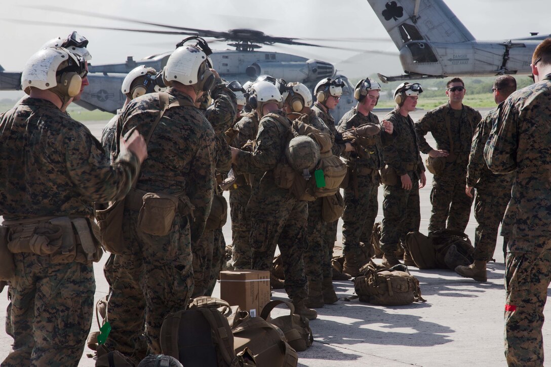 U.S. Marines with the Battalion Landing Team 2nd Battalion, 6th Marine Regiment, 26th Marine Expeditionary Unit (MEU), prepare to depart from the Henry E. Rohlsen Airport in St. Croix, U.S. Virgin Islands, Sept. 11, 2017. Marines worked alongside joint Department of Defense forces and Federal Emergency Management Agency to provide food, water, and other essential care items in support of Hurricane Irma relief efforts. (U.S. Marine Corps photo by Lance Cpl. Alexis C. Schneider)
