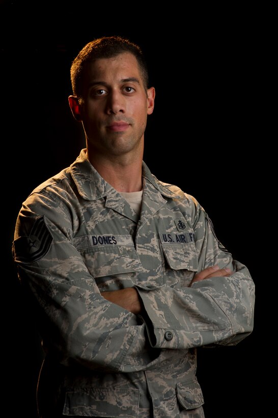ech. Sgt. Robert Dones, 349th Medical Squadron surgical technician, poses for portrait at Travis Air Force Base, Calif., on Sept. 9, 2017. On Sept. 2, Dones went hiking on the Eagle Creek Trail in the Columbia River Gorge near Portland, Ore. While on the hike, a forest fire broke out. Dones helped gather a group of hikers who were stranded on the trail with the fire separating them from their way back. Approximately 150 hikers were led to safety aided by Dones.