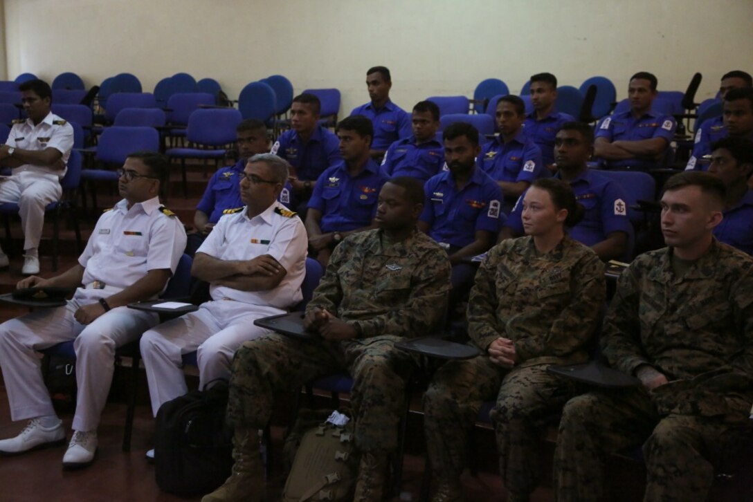 Members of the U.S. and Sri Lanka Navy came together for the opening ceremony of Sri Lanka Health Engagement 17 at Naval Base Welisara, Sri Lanka, Sept. 11, 2017. During SLHE-17, U.S. Navy Corpsmen will train members of the Sri Lanka Navy to conduct their own Combat Life Saver classes to further develop their medical capabilities. (U.S. Marine Corps photo by Sgt. Kathy Nunez)