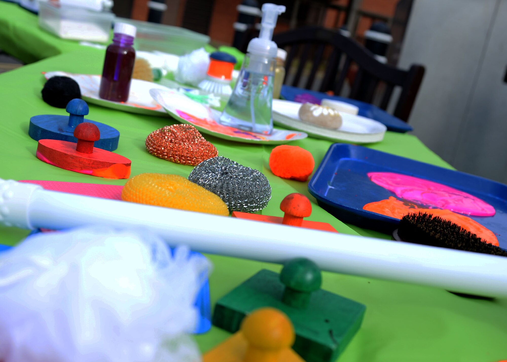 Various art and crafts supplies are laid out in preparation for the U.K. Child and Youth Conference Sept. 9, 2017, at RAF Mildenhall, England. During the ‘Let’s Get Messy’ class, childhood development center staff were given suggestions on how to host an art class. Some of the other classes covered customer service, activity planning and nutrition. (U.S. Air Force photo by Senior Airman Justine Rho)